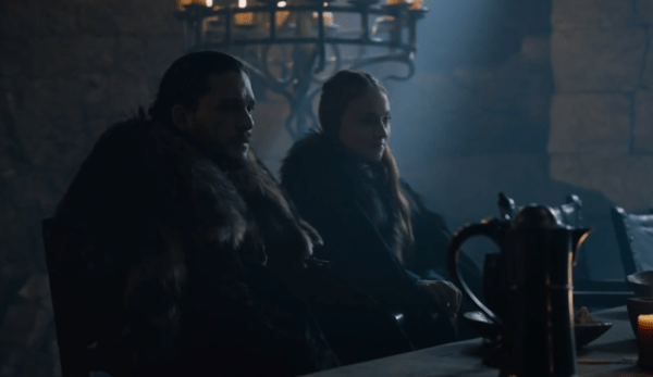 rob_and_sansa_seated_at_the_main_table_inside_the_hall_of_winterfell_listens_in_astonishment_to_lady_lyanna_mormont